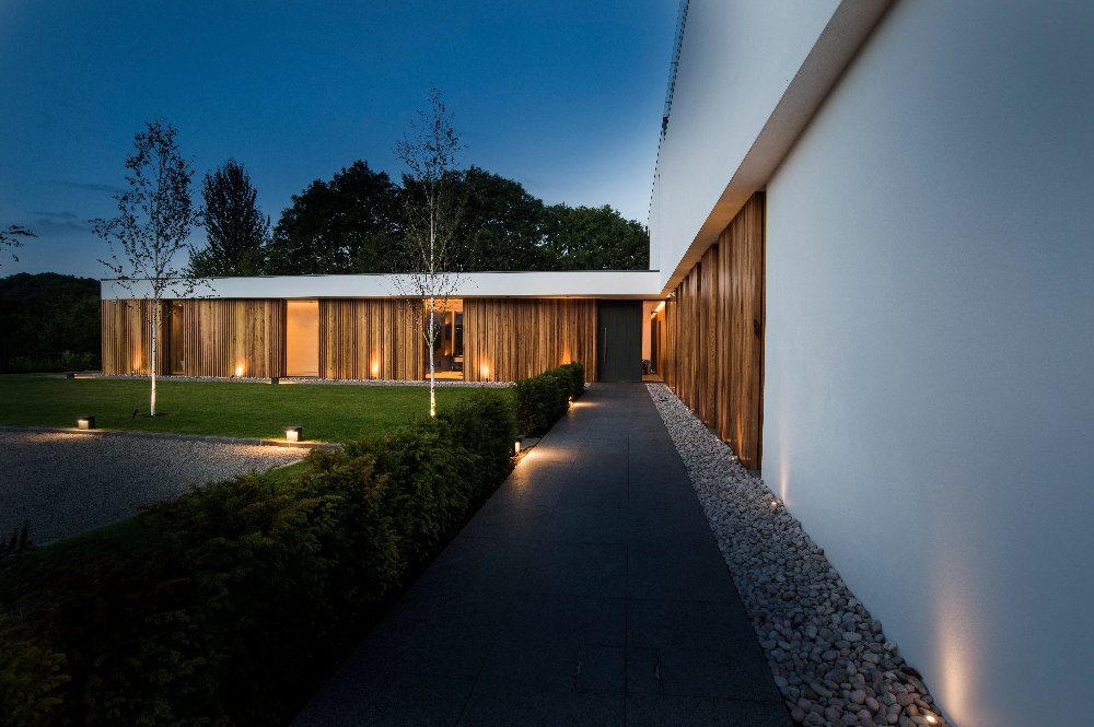 An elegant modern villa with cantilevering forms, overlooking the River Clyde, South Lanarkshire