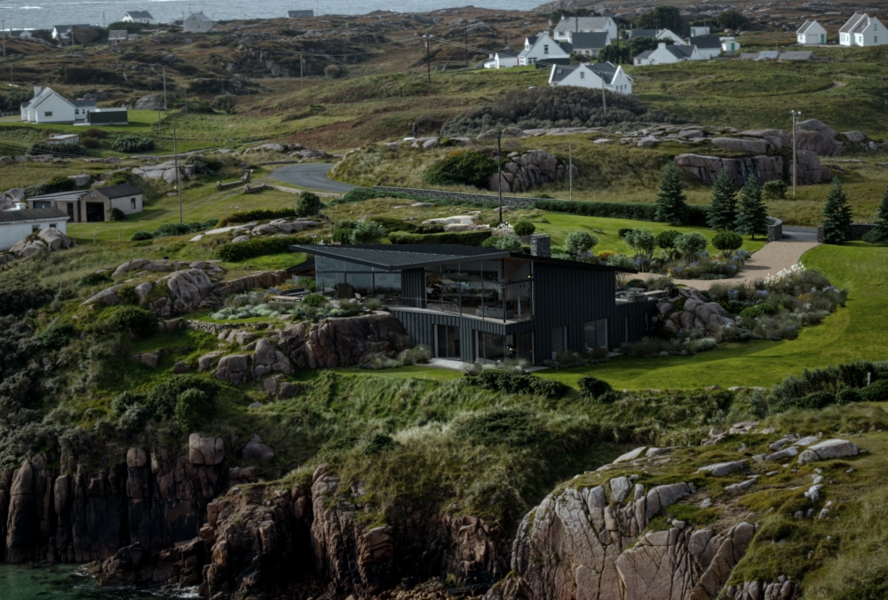 Island retreat on the edge of a rocky cliff