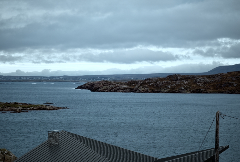 Island Retreat on Rocky Cliff