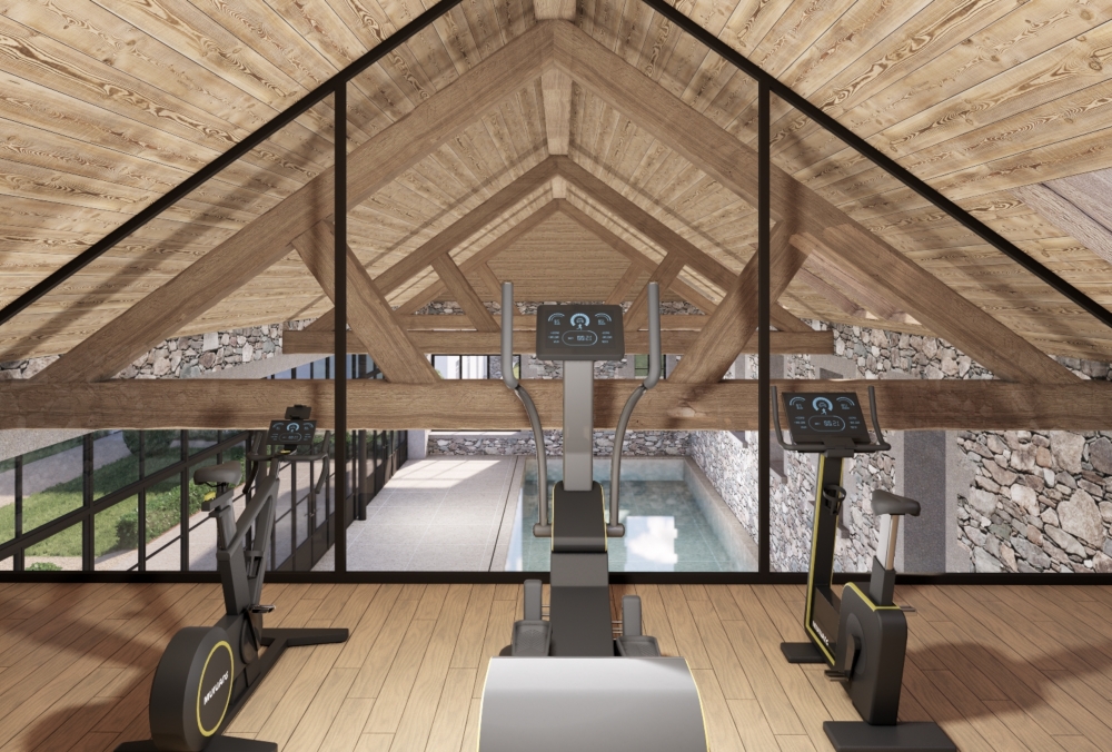 Pool house integrated between existing stone outbuildings and main house in Guernsey. Pool house integrated between existing stone outbuildings and main house in Guernsey.