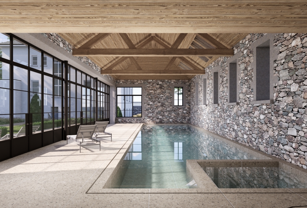 Pool house integrated between existing stone outbuildings and main house in Guernsey. Pool house integrated between existing stone outbuildings and main house in Guernsey.