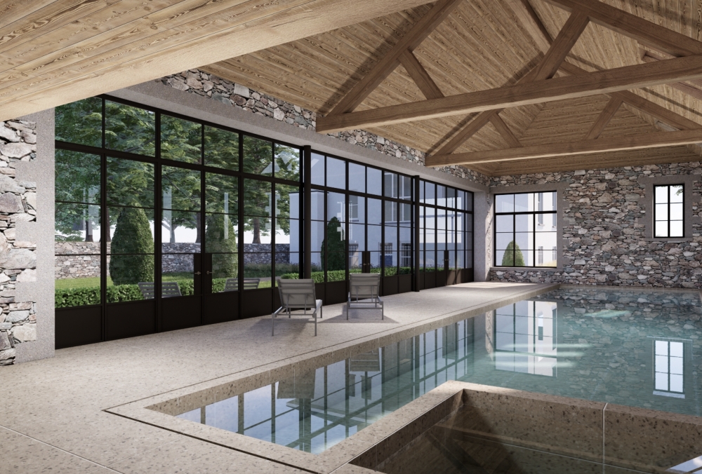 Pool house integrated between existing stone outbuildings and main house in Guernsey. Pool house integrated between existing stone outbuildings and main house in Guernsey.