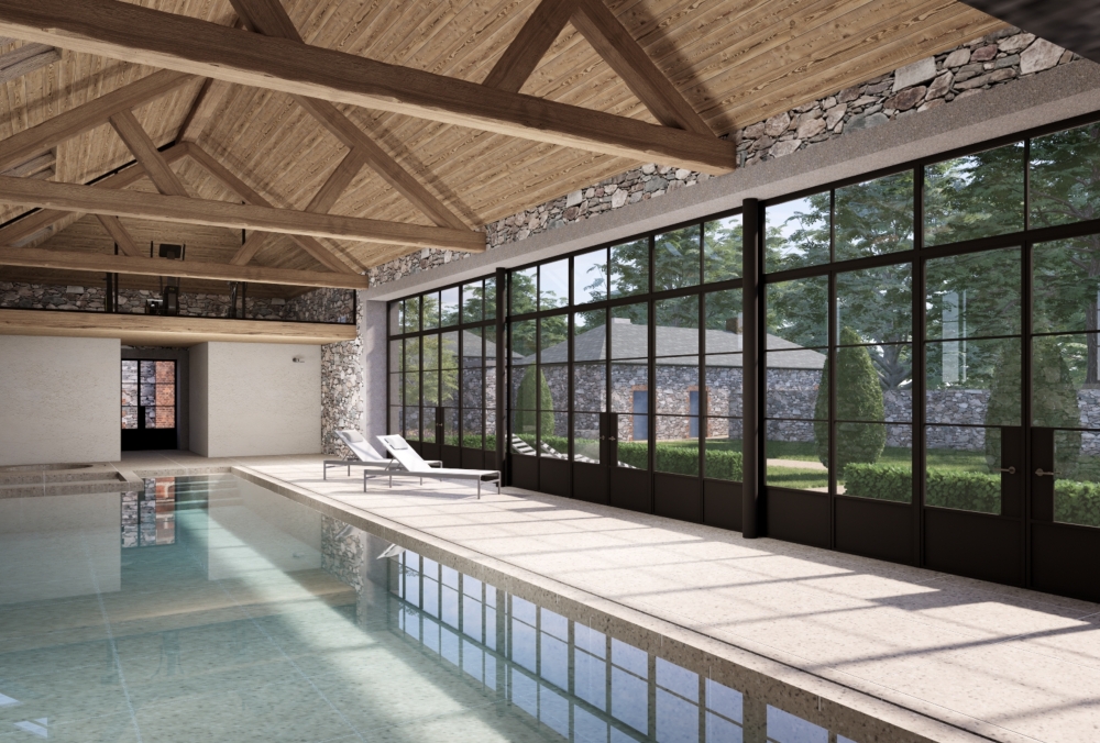 Pool house integrated between existing stone outbuildings and main house in Guernsey. Pool house integrated between existing stone outbuildings and main house in Guernsey.