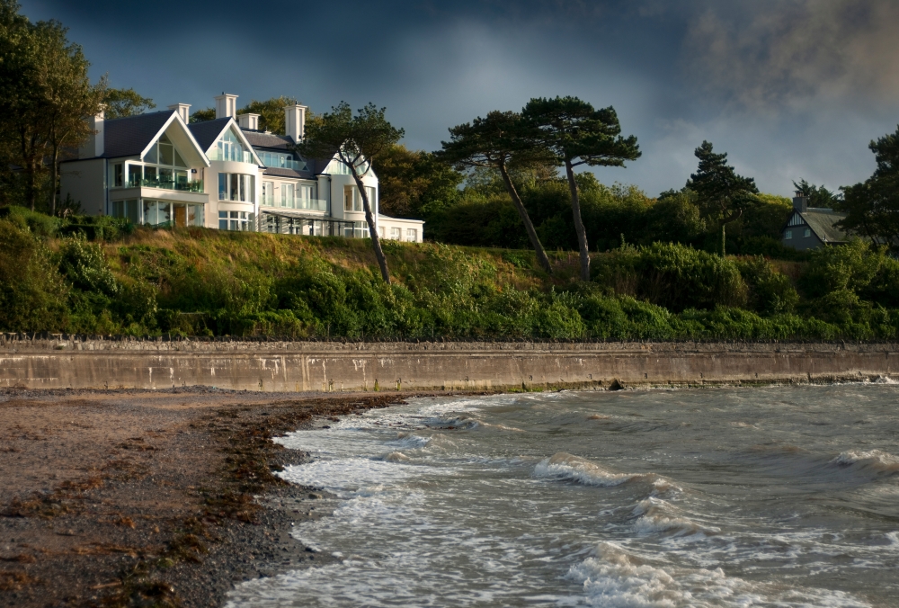 Landmark home on elevated coastal site with panoramic views