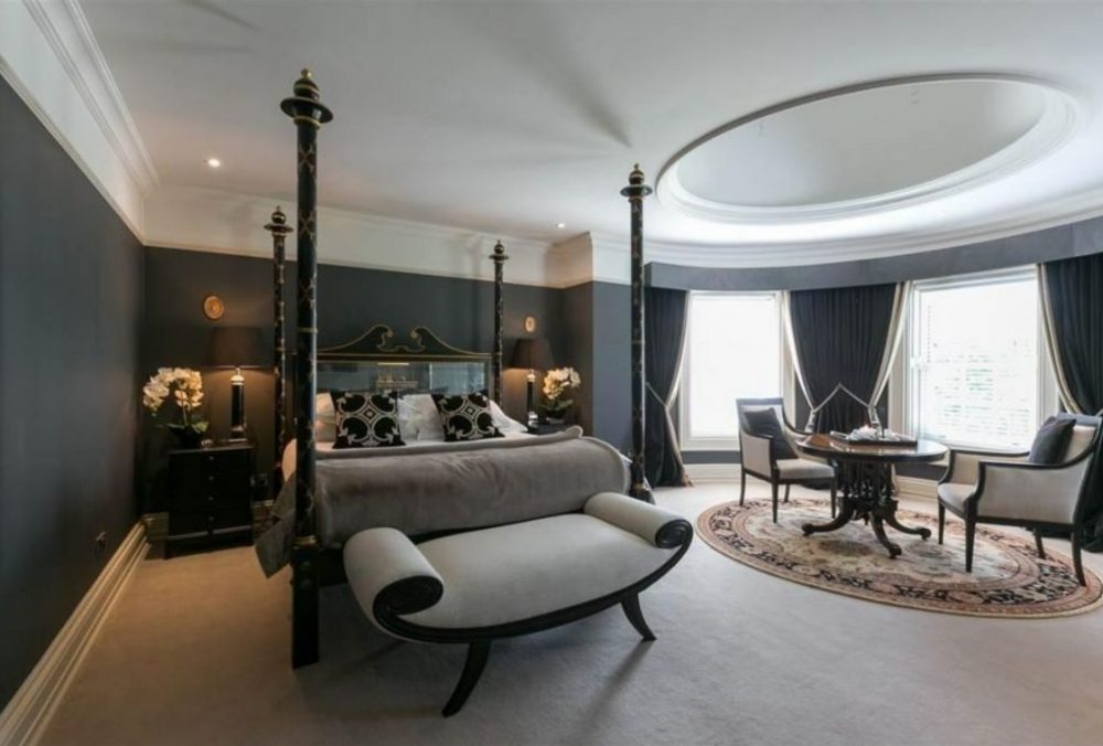 Boldly Styled House with Two-Storey Circular Bays Boldly Styled House with Two-Storey Circular Bays