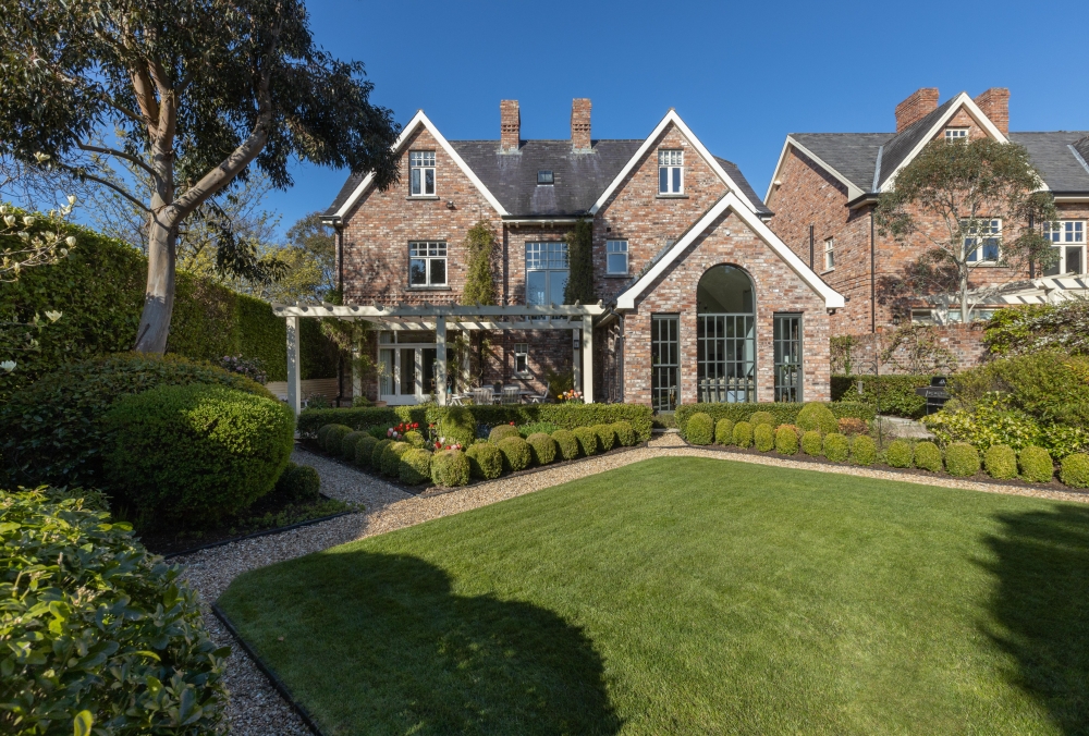 Pair of Complementary Salvaged Brick Dwellings