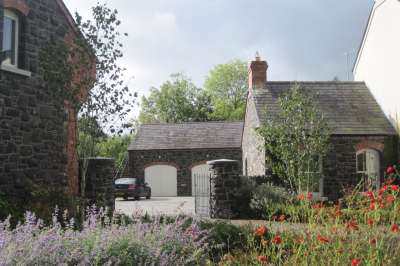 newly_built_rendered_cottage_with_wings_and_outbuildings_2