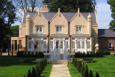 Private gothic mansion fully restored with new garden room to terrace, brick built courtyard and grand entrance gates